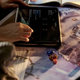 A player uses a tablet during a game of Dungeons & Dragons.